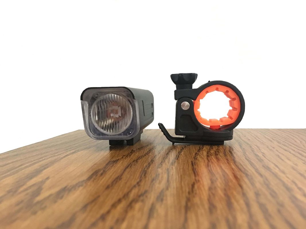 IP64 Waterproof Powerful Led Bike Lights Black Color Charged By 4*AA